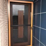 crimsafe front door with security screen and wooden door closed - hinged doors toowoomba